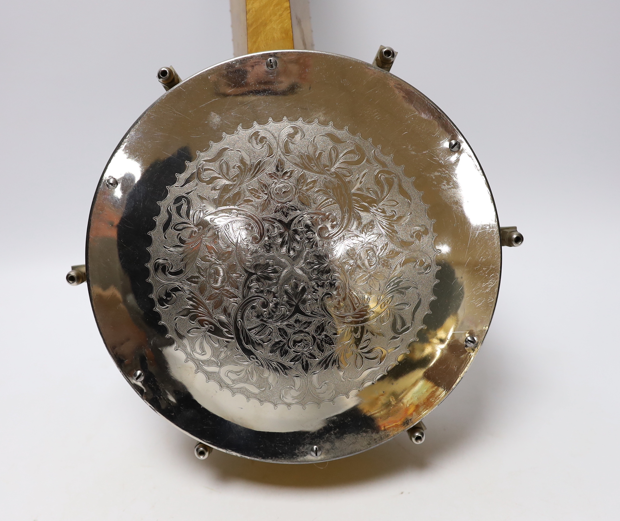 A cased banjo ukulele